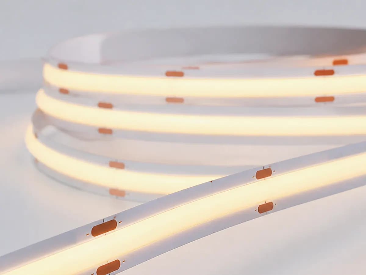 Cool-white COB LED strip glowing in a continuous line